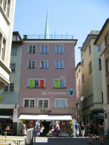 Zurich: Niederdorfstrasse (Downtown
                        Street), house of Weissgerwe with the church
                        steeple of Preacher's Church behind