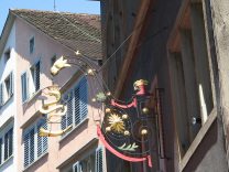 Zurich, Marktgasse (Market Alley), the
                        shield of the Smithery guild hall