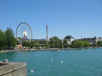 Zurich Quaibrcke (Quay Bridge), sight of
                        the fair with giant wheel on Sechseluten meadow
                        and Zurich Opera House
