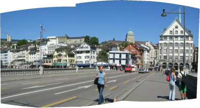 Zurich, Rudolf Brun Bridge, sight of Limmat
                        Quay with the university in the background,
                        panorama photo