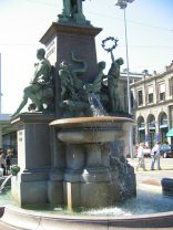 Alfred Escher Fountain, sculptures at the
                        column 02