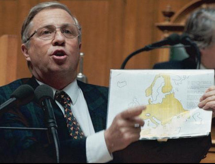 Mr. propagandist Blocher explaining his version
                    of Swiss history with a map of 1943, March 18, 1997